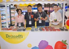 Driscoll's Asia team members showing the berries.